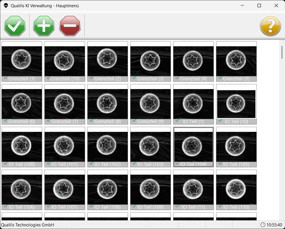 QuaVis AI management interface showing classified inspection images — IO (pass) and Grenzteil (borderline) parts